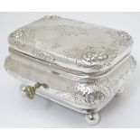 A Continental silver box with floral decoration,