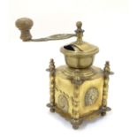 A late 20thC brass coffee grinder. Approx.