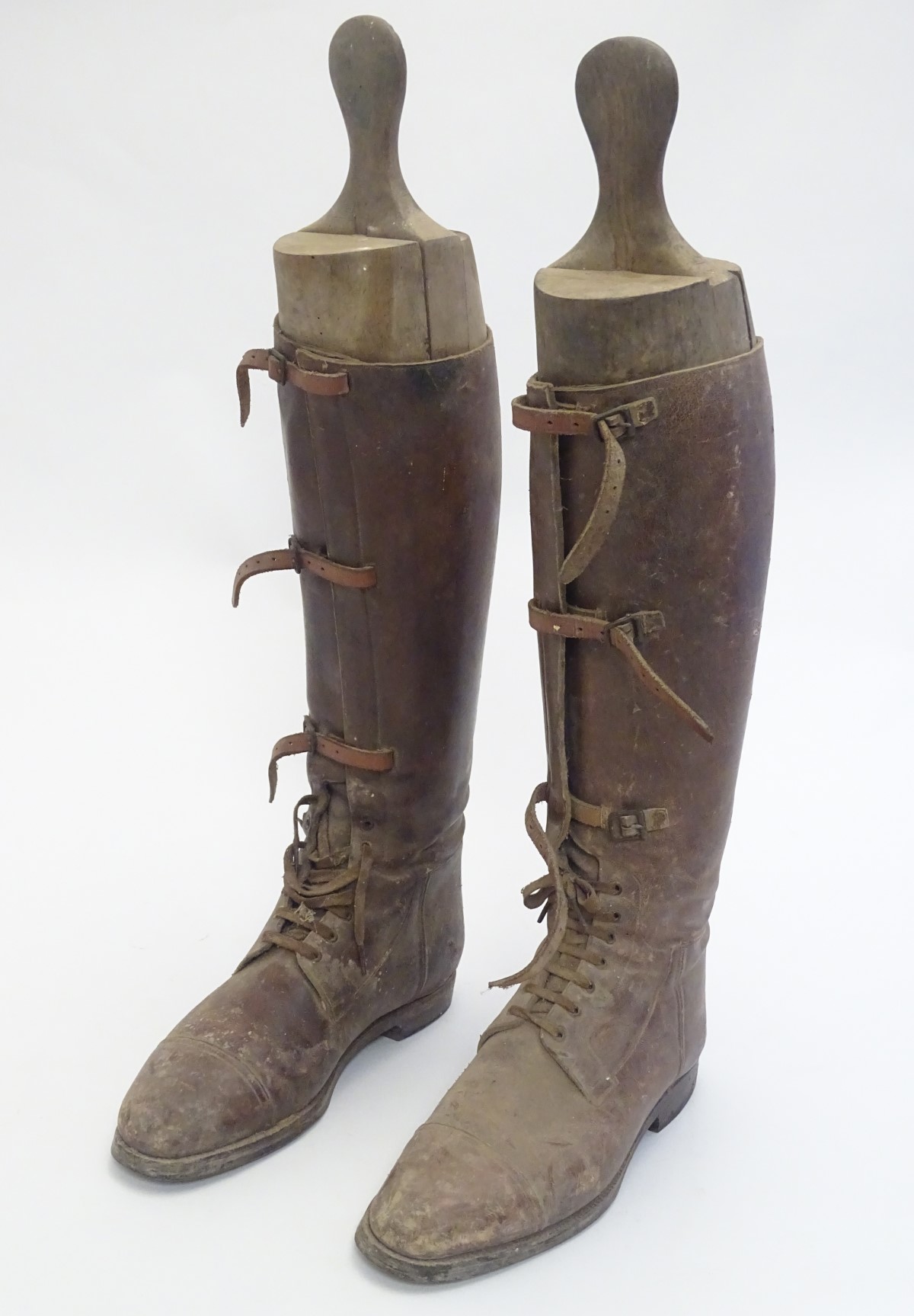 An early to mid 20thC pair of brown leather field / cavalry pattern riding boots,