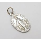 An Italian white metal pendant depicting image of the Virgin Mary 1" long CONDITION: