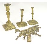 Four assorted 20thC brass items to include a Boy Scout wolf finial / flag topper,