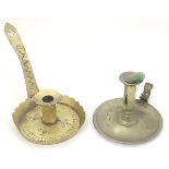 A Victorian chamberstick with engraved decoration and inscribed Good Night, together with another.