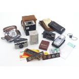 An assortment of vintage cameras and equipment, to include Kodak models 'Retinette IB' 35mm,