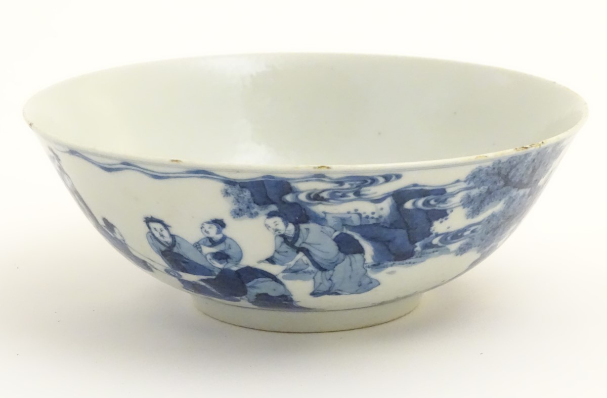 A Chinese blue and white bowl depicting figures in a landscape. Character marks under. - Image 7 of 8