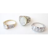 Three various rings, including a 14ct gold ring set with cubic zirconia,