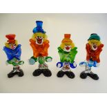 Four assorted retro Murano glass clowns.