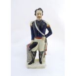 A large Victorian Staffordshire pottery portrait figure depicting Louis Napoleon. Titled to base.