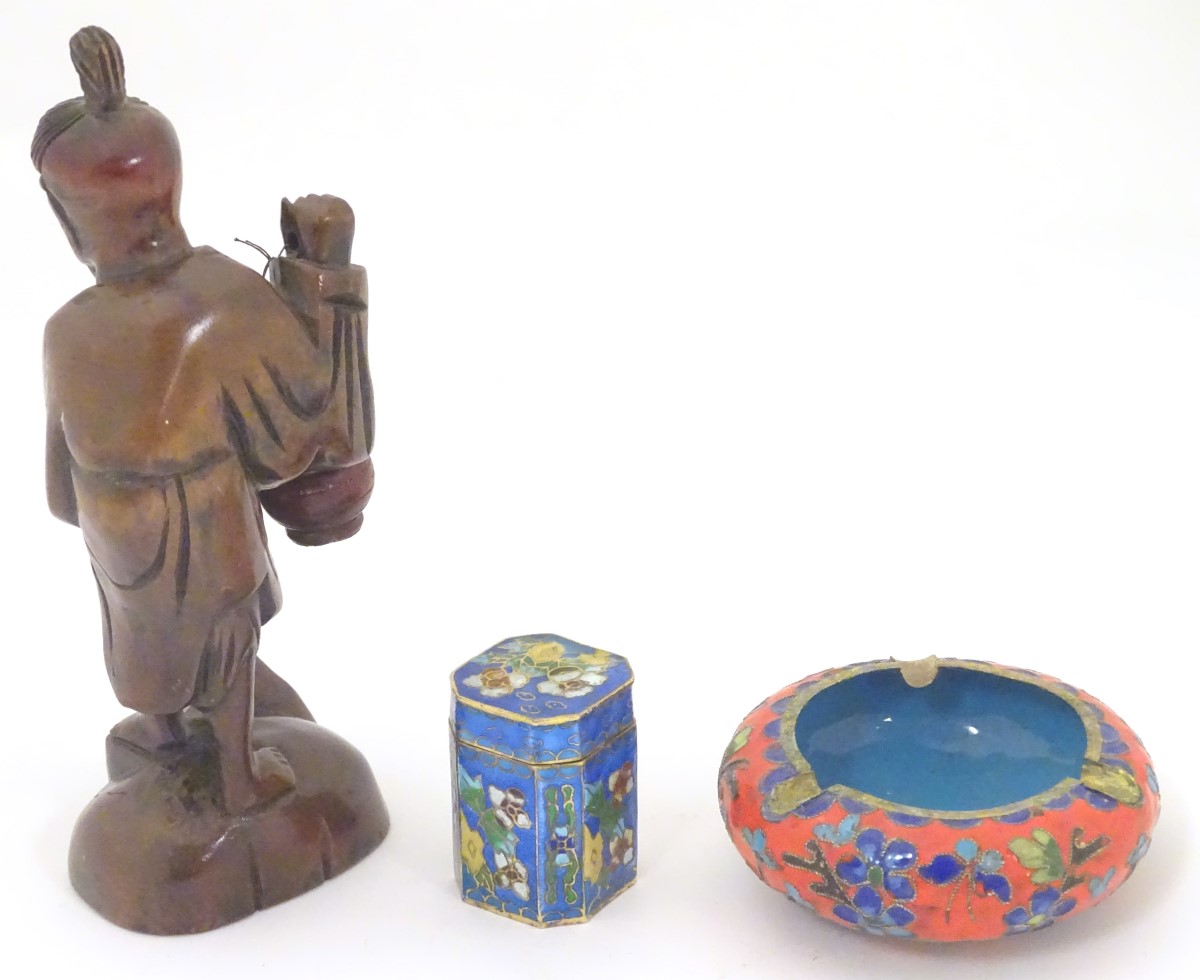 Three assorted oriental items, to include a carved figure with a fish and hanging pot, - Image 4 of 7