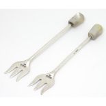 Two silver butter / sweet meat forks with mother of pearl handles, hallmarked Sheffield 1936,