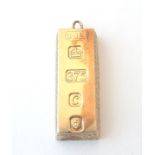 A retro 9ct gold pendant of ingot form, hallmarked Sheffield 1977, with silver Jubilee mark,