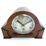 A 1930s-1940s mantel clock, the face stamped 'Made in England', movement with chimes,