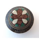 An early 20thC gilt metal stud / brooch with Greek key enamel decoration and inlaid malachite etc