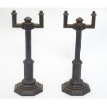 A Victorian pair of cast iron firedogs / fire tool stands,