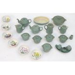 A quantity of Denby stoneware comprising a lidded pot, 5 lidded ramekins / small pots, 2 teapots,