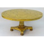 A 20thC dining / breakfast table with a painted circular top above a canted and moulded pedestal