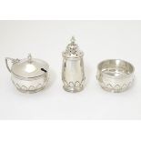 A silver 3-piece cruet set comprising pepper mustard pot and salt.