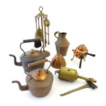 A quantity of brass and copper items, to include copper kettles, fire tools and stand,
