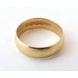 A 22ct gold ring. Ring size approx.