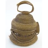 Ethnographic / Native / Tribal : A woven Abelam Yam festival basketry helmet mask of domed form