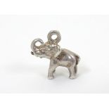 A novelty white metal pendant charm formed as an elephant.