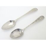 Two George III silver Old English pattern teaspoons with bright cut decoration. Each approx.