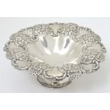A Victorian silver pedestal bowl with embossed and pierced decoration. Hallmarked Birmingham 1899.