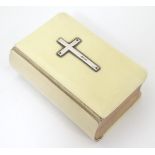 A small ivory bound book of common prayer with gilt page edges,
