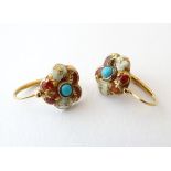 A pair of gold drop earrings set with central turquoise and decorated with red and white enamel