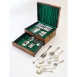 A quantity of silver plate flatware to include spoons forks, knives, preserve spoons etc,