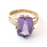 A 9ct gold ring set with facet cut amethyst. Ring size approx.