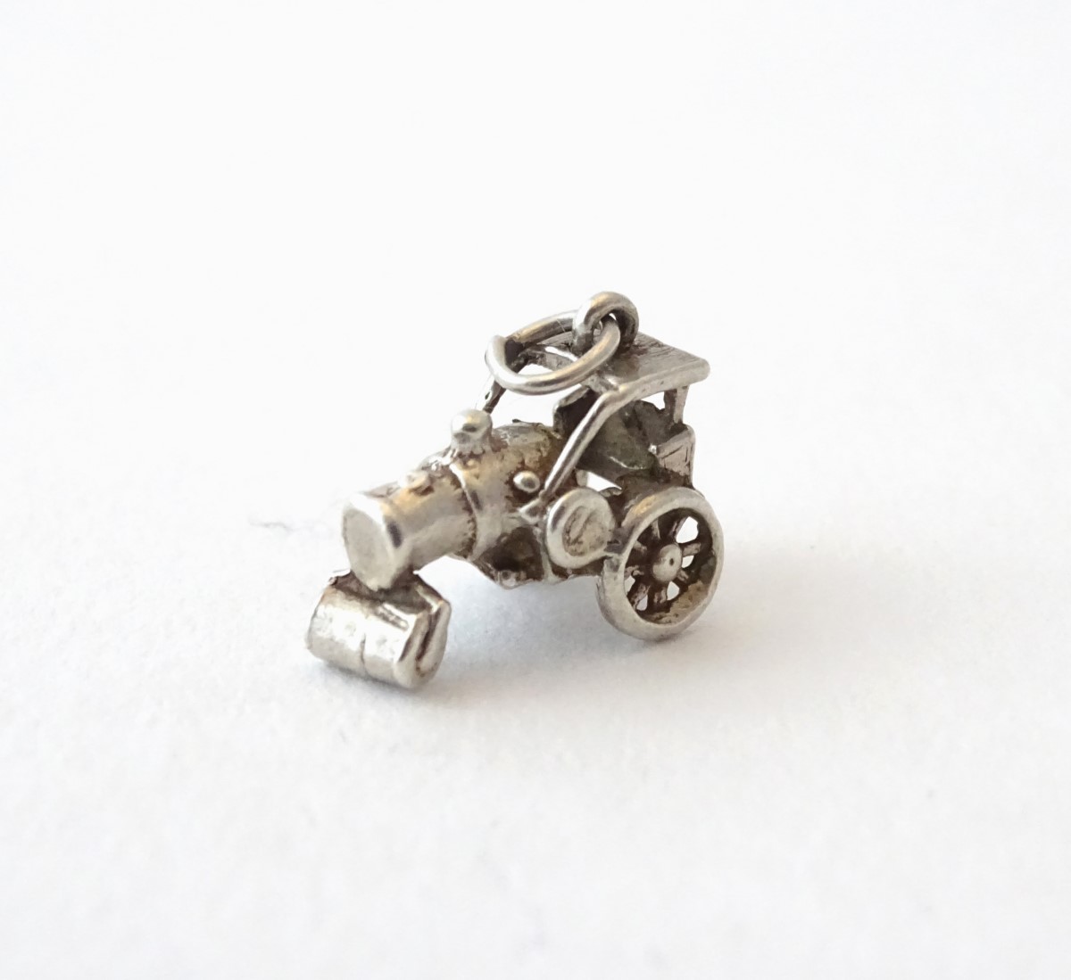 A novelty white metal charm formed as vintage steam roller. - Image 2 of 7