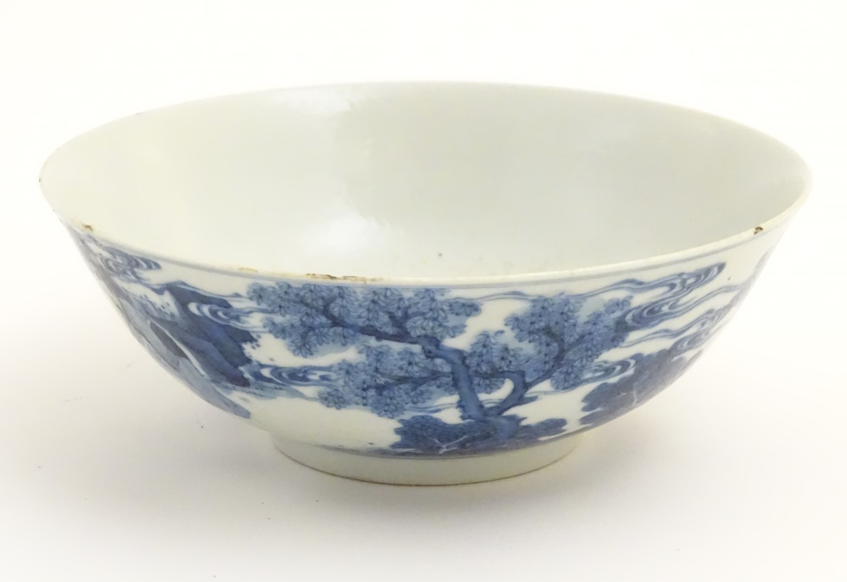 A Chinese blue and white bowl depicting figures in a landscape. Character marks under. - Image 4 of 8