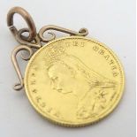 Coin : A Queen Victoria 1887 gold half sovereign in hanger mount,