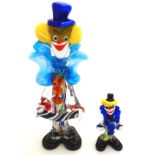 A large retro Murano glass clown, together with a smaller example.