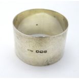 A silver napkin ring, hallmarked Sheffield 1946,