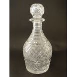 A cut glass decanter with banded decoration 10 1/4" high CONDITION: Please Note -