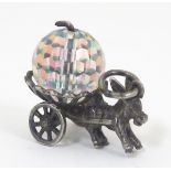 A novelty pendant charm formed as a donkey pulling a cart decorated with a facet cut bead.
