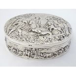 Continental silver table box of oval form profusely decorated with various Continental hunting