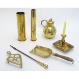 A quantity of assorted brassware, to include a chamber stick, lamp, trivet,
