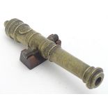 Militaria: an 18th-19thC English bronze model naval cannon,