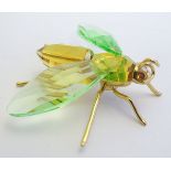 Swarovski crystal a model of a bug / insect from the paradise collection with silver gilt mounts.