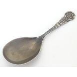 A silver caddy spoon, with Tudor rose to handle, hallmarked Birmingham 1973, maker J. B.