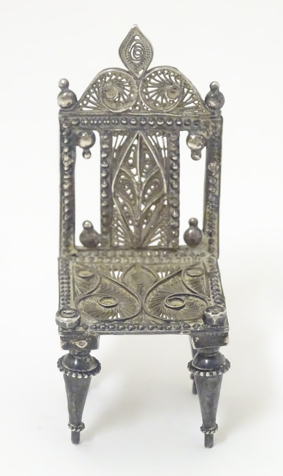 A silver miniature model of a chair with filigree decoration. - Image 3 of 5