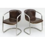A pair of late 20thC cantilever open armchairs with chrome frames and tan leather upholstered