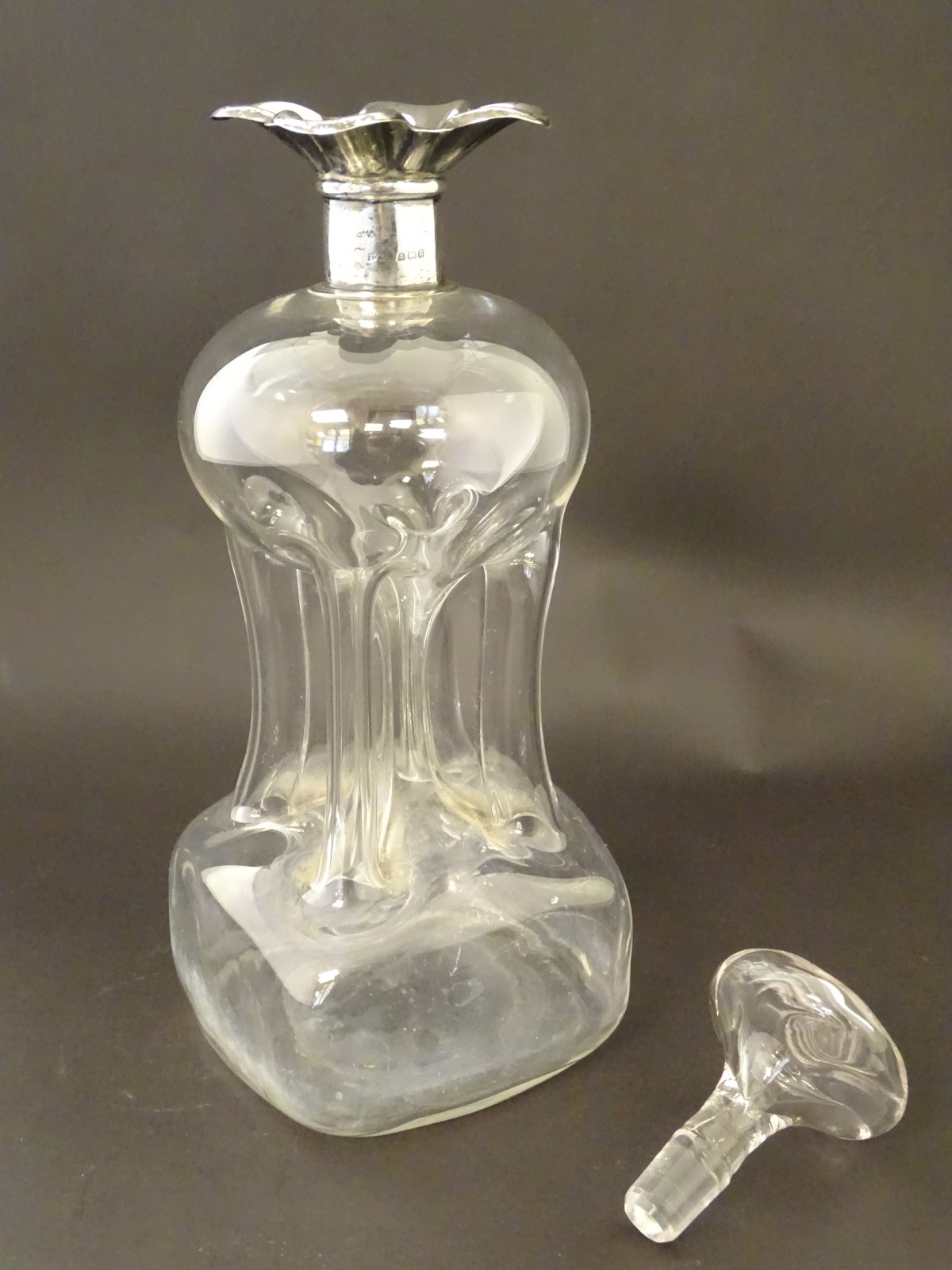 A glass decanter with pinch waist detail and silver rim hallmarked Birmingham 1906. 11" high - Image 4 of 8