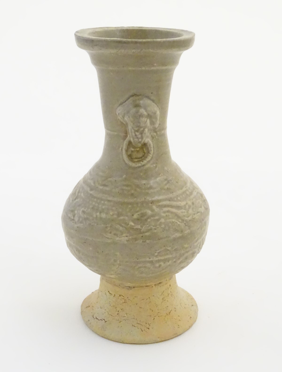 An Oriental earthenware vase with a flared base and rim, elephant head handles. - Image 4 of 6