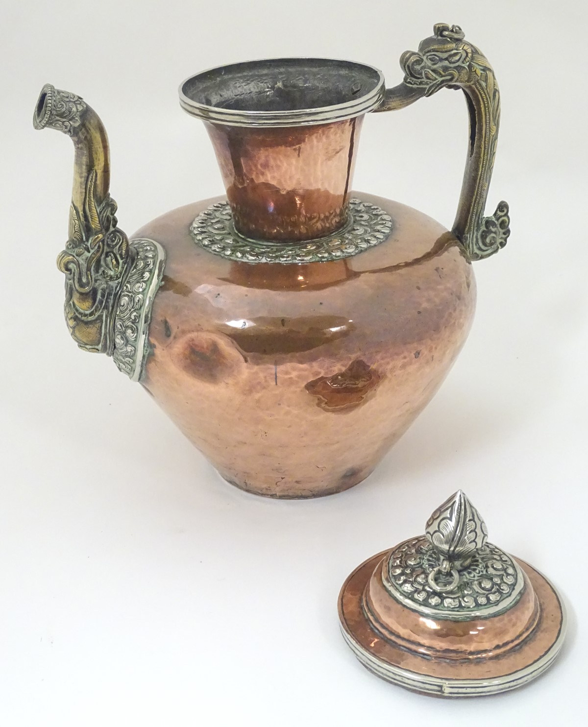 Decorative Metalware: A 19thC / 20thC lidded copper kettle with ornate silver plate mounts, - Image 6 of 6