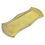 An Arts & Crafts brass oblong tray with embossed natural form decoration. Stamped W. H.