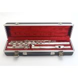 A silver flute titled Imperial by Boosey & Hawkes, marked Made in England and numbered 232636,