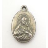 A mid 20thC Italian Christian religious souvenir pendant depicting Lady of Fatima to one side and